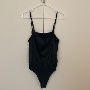 Black bodysuit with snap thong bottom. Silk like material. Like new.